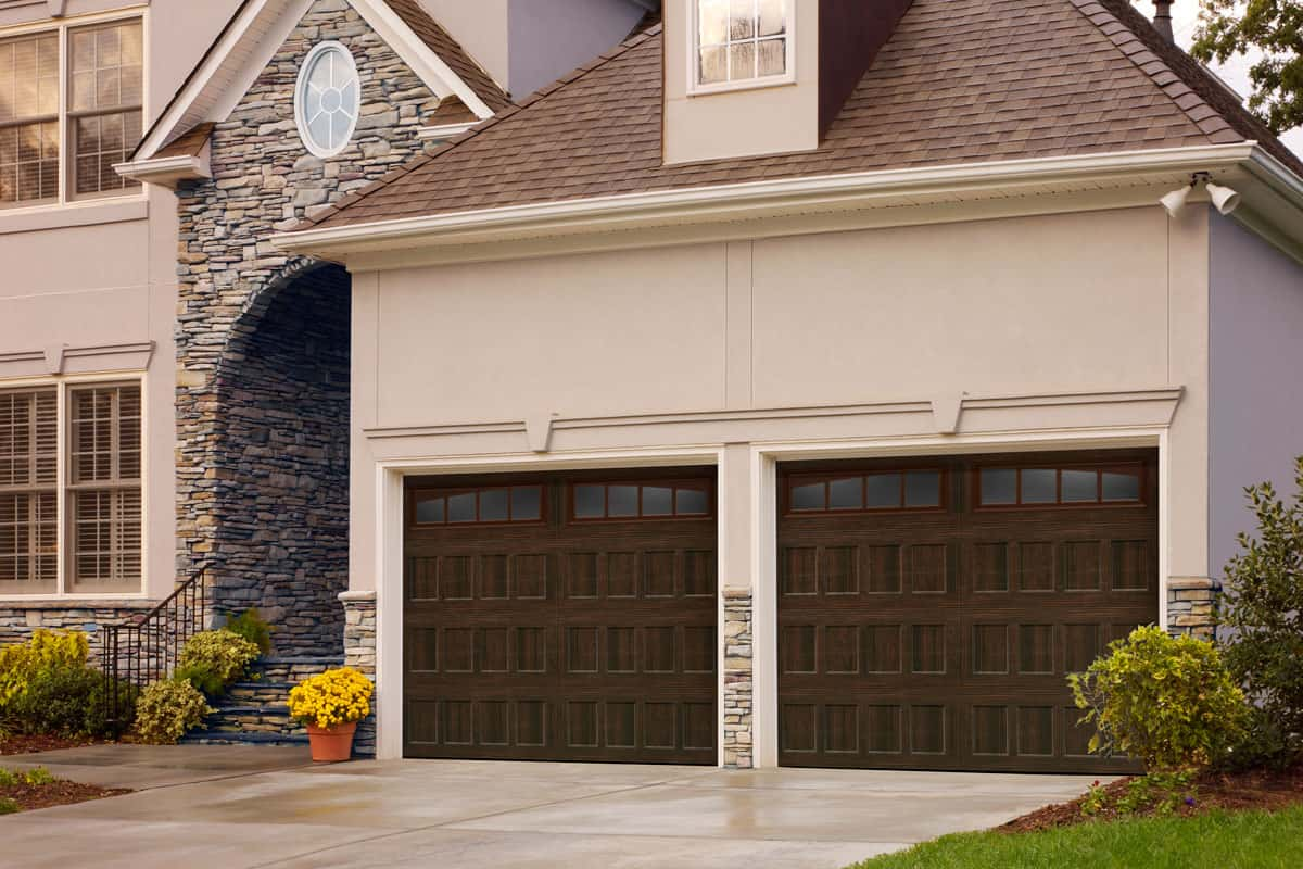 House with wood composite garage door 